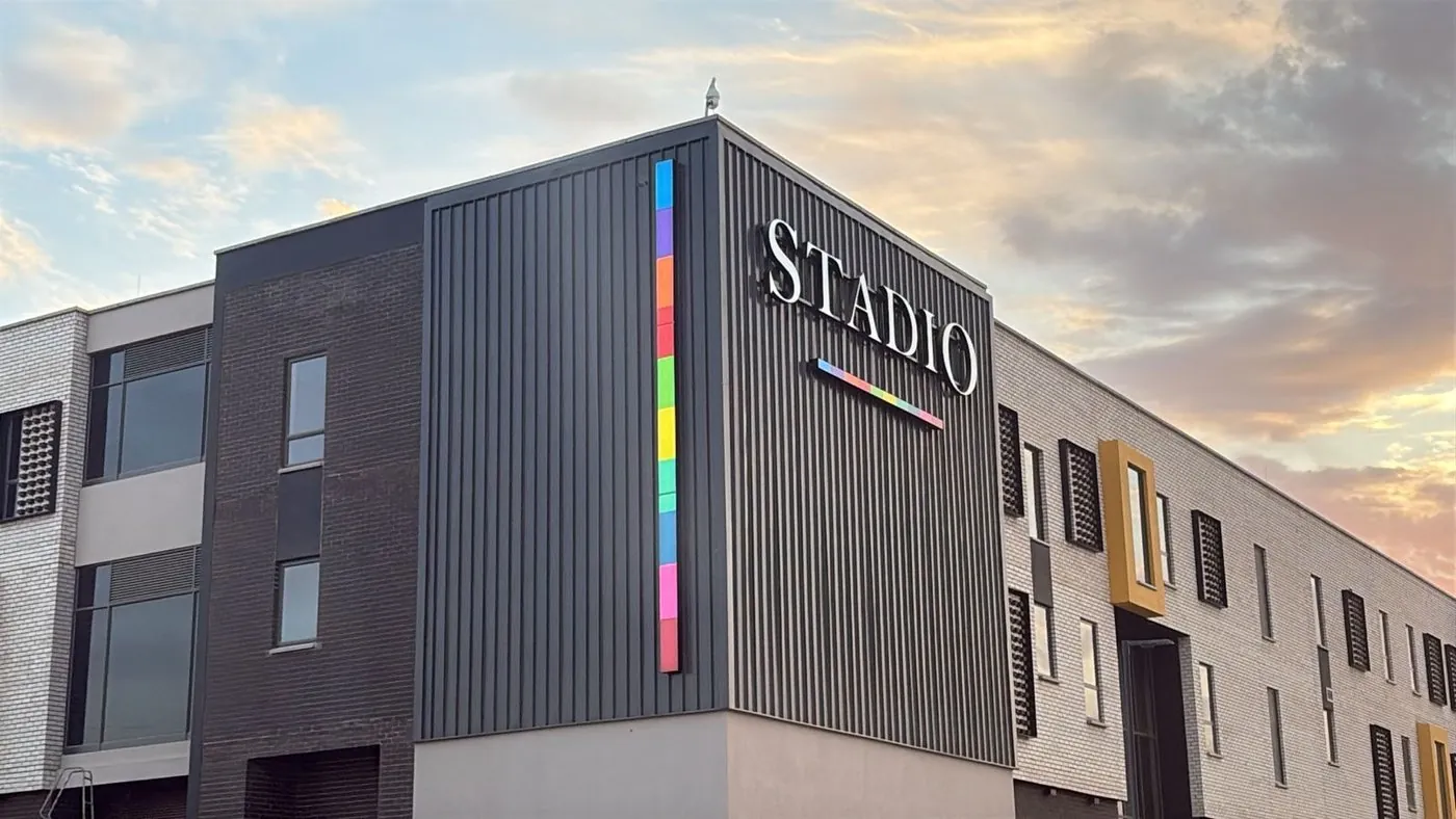 Stadio building signage installation
