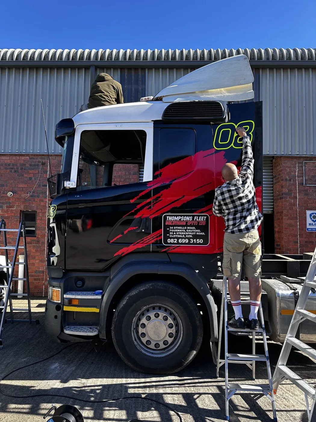Truck fleet wrap installation in progress