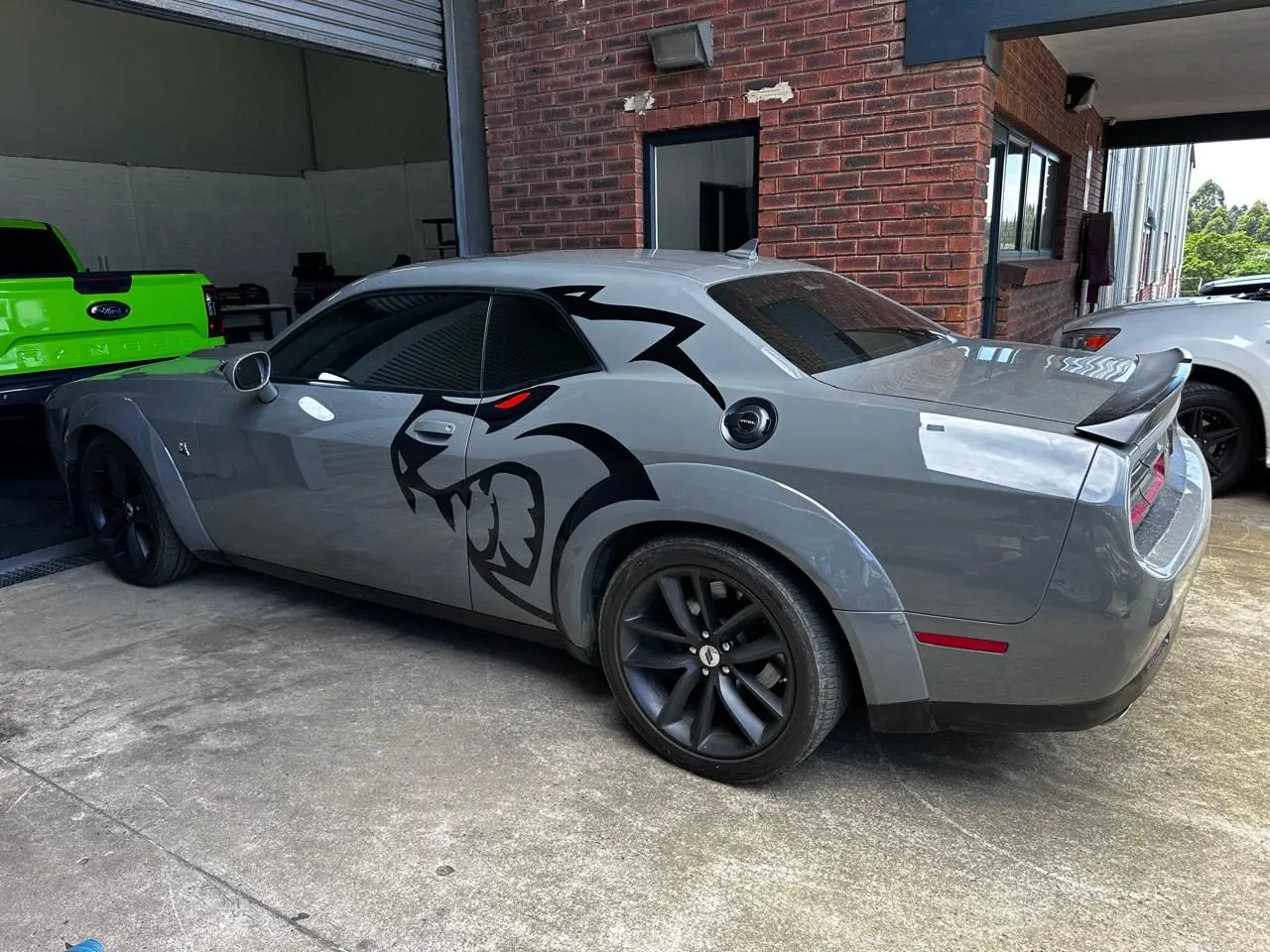 Grey Dodge Challenger with custom Hellcat decal graphics